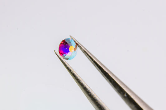 Okrągłe diamenciki Swarovski polaryzujące AB 100szt